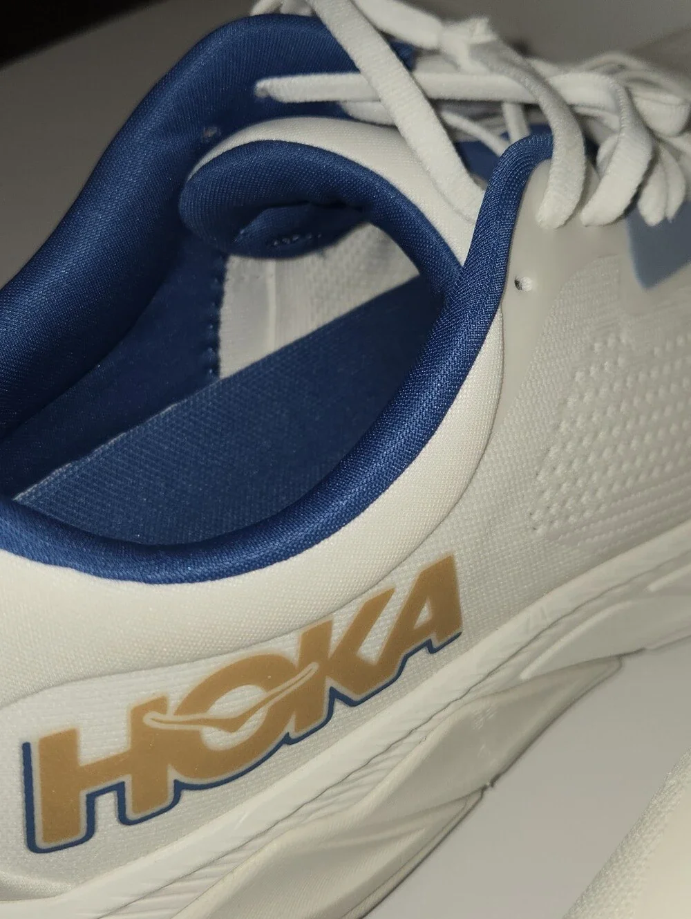 Hoka One One White and Navy Athletic Running Shoes with Gold Logo